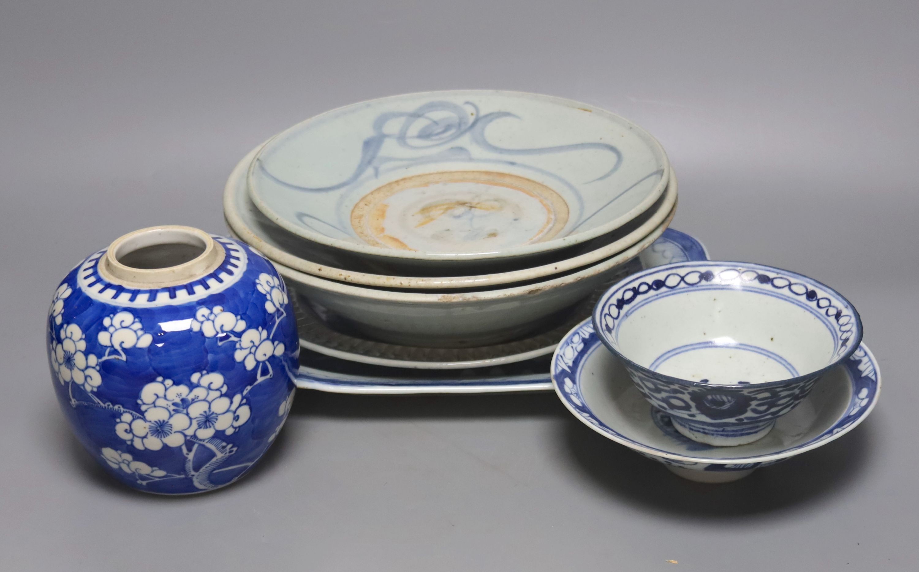 Two 19th century Chinese blue and white dishes and various jars and brush pots, largest item meat platter 33cms wide.